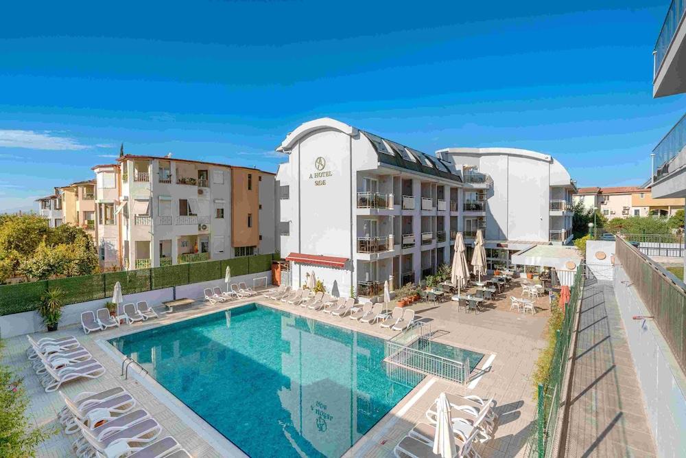 A HOTEL SIDE — SIDE