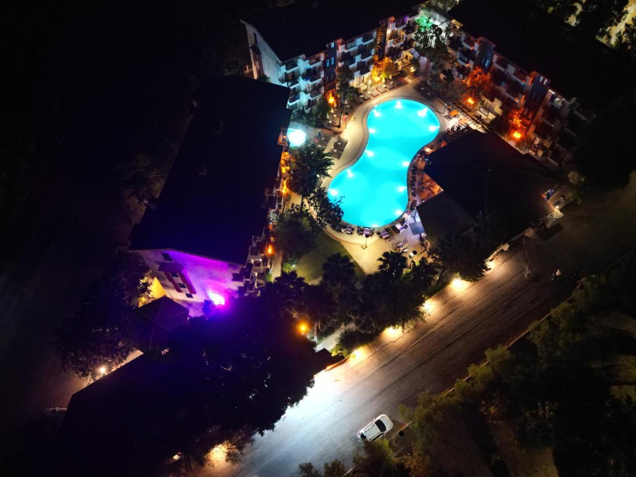 LEMAS SUITE HOTEL — SIDE