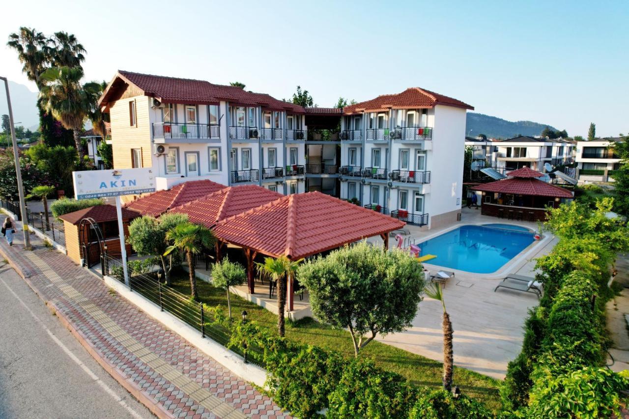 AKIN APART AND HOTEL — CAMYUVA