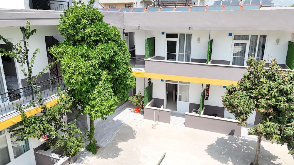 HILLSIDE APART HOUSE — SIDE