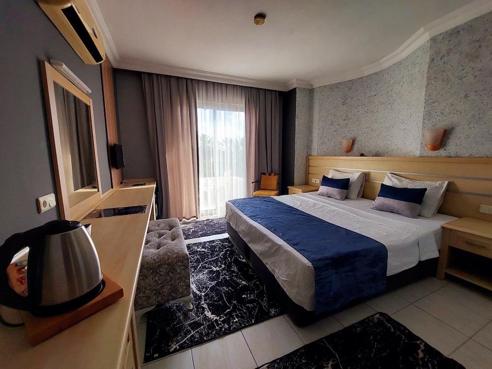 SUMMER ROSE HOTEL — SIDE — фотография отеля №9