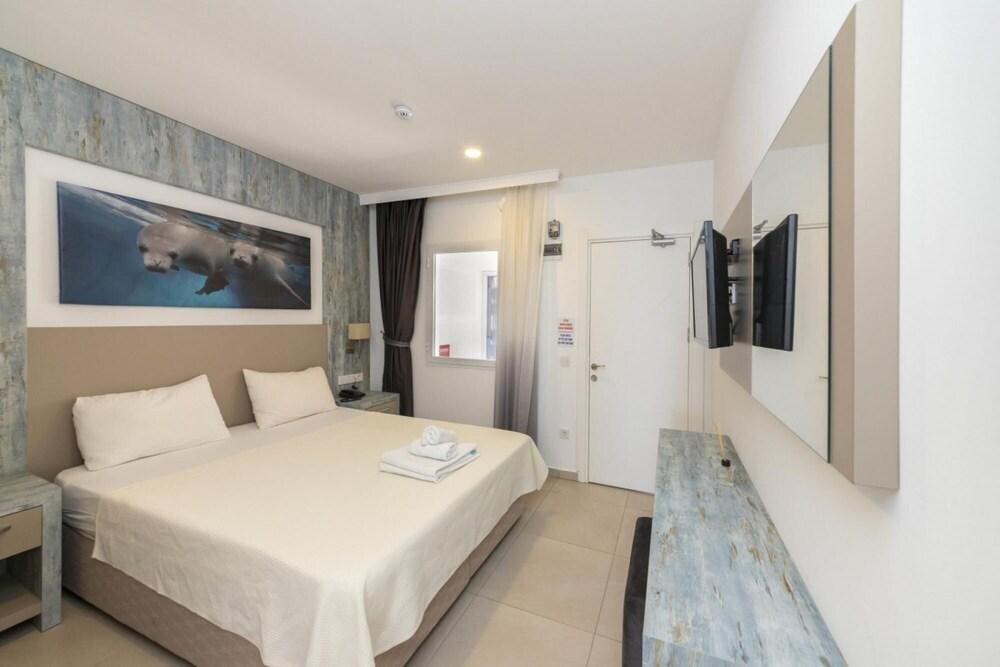 SEAFRONT FLAT WITH EXCELLENT SEA VIEW IN BODRUM — BODRUM — фотография отеля №8