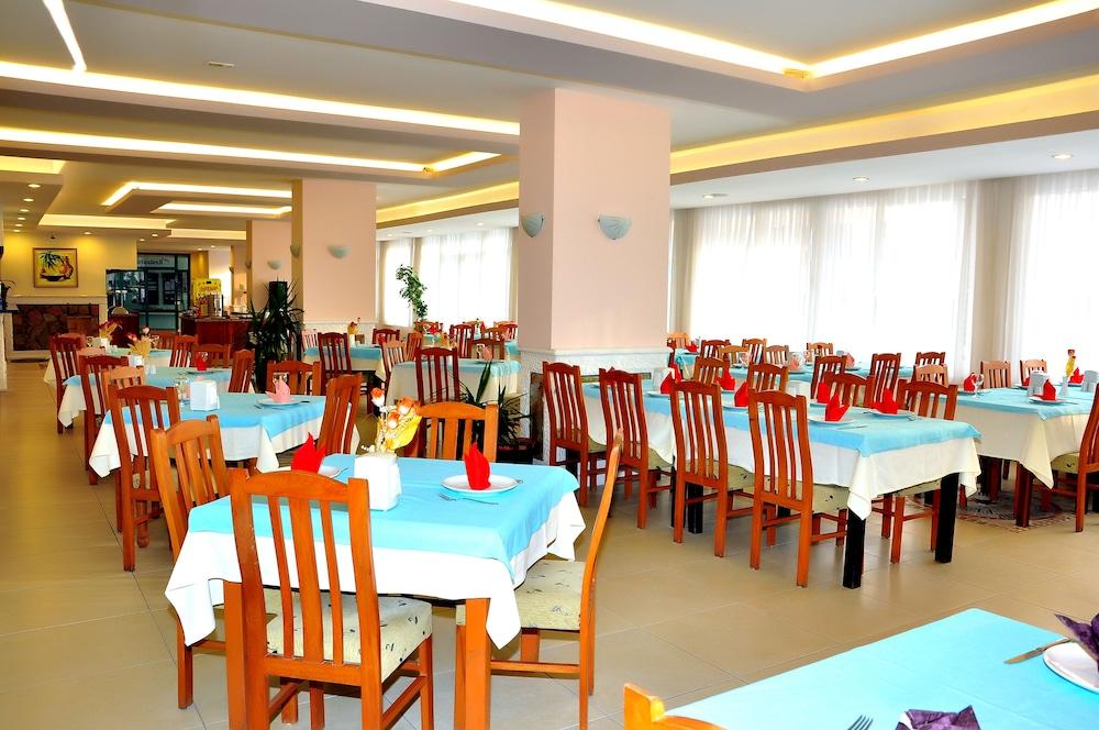 CINAR FAMILY SUITE HOTEL — SIDE