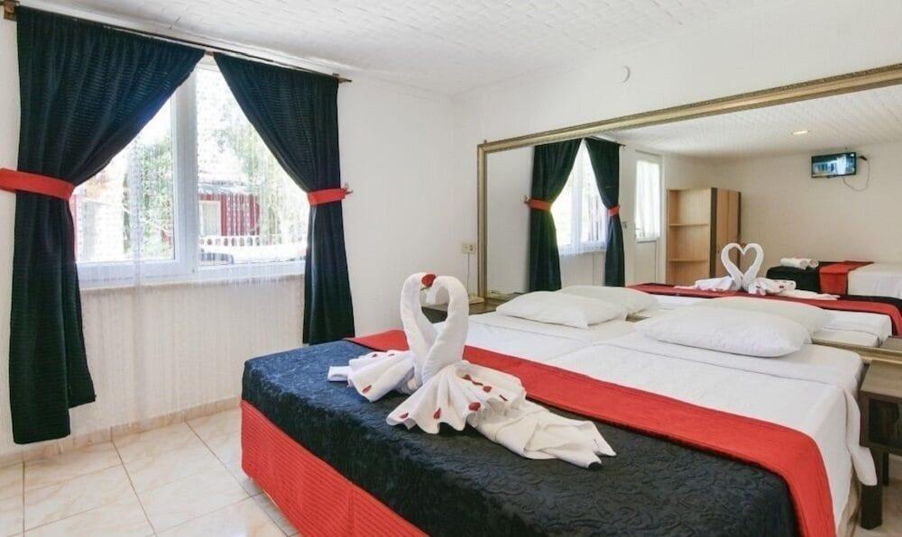 ALTINKUM BUNGALOW HOTEL — SIDE — фотография отеля №10