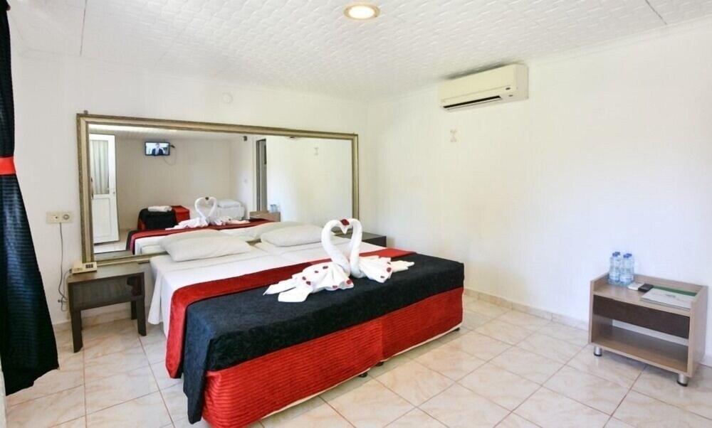 ALTINKUM BUNGALOW HOTEL — SIDE — фотография отеля №9