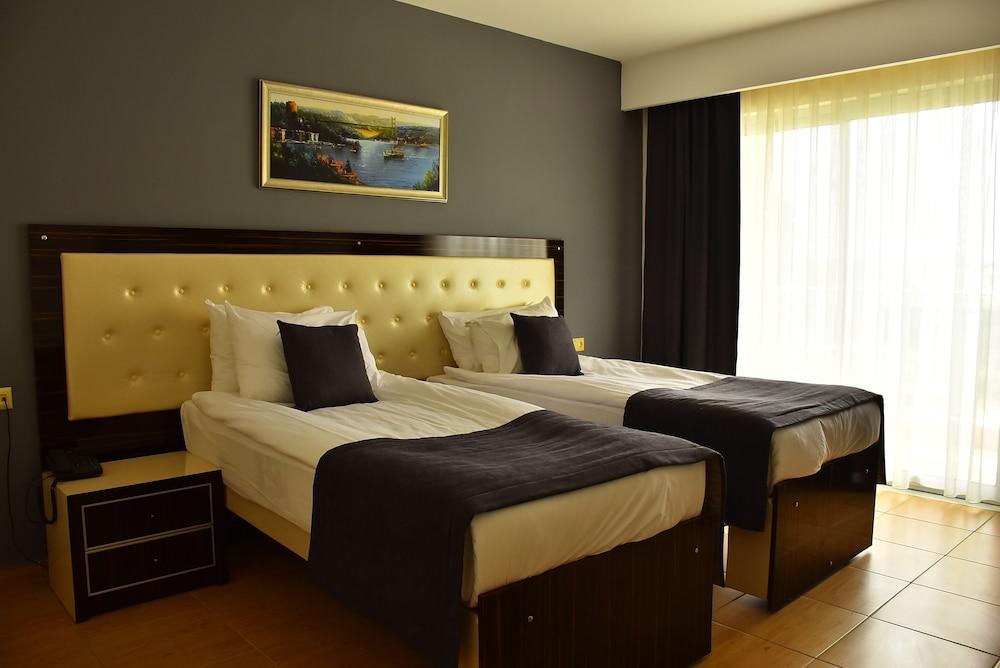 NORA SUIT HOTEL — SIDE — фотография отеля №11